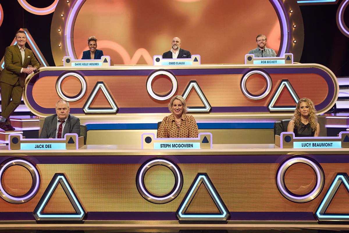 Jack Dee on the set of Blankety Blank with six other celebrities